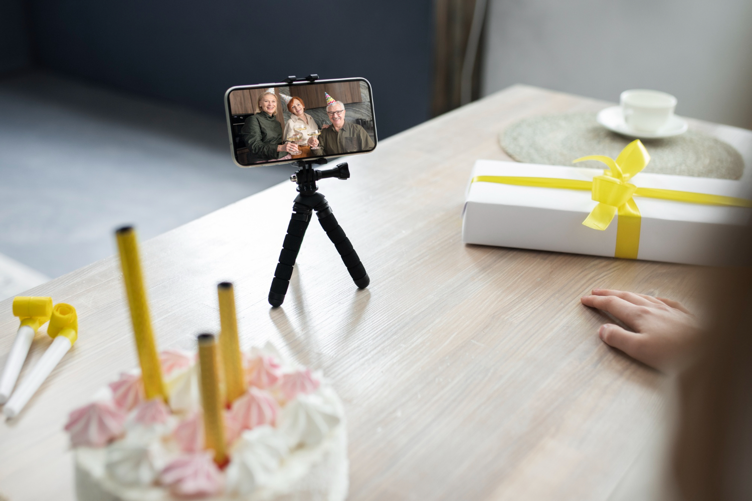 A girl broadcasts from a phone on a tripod
